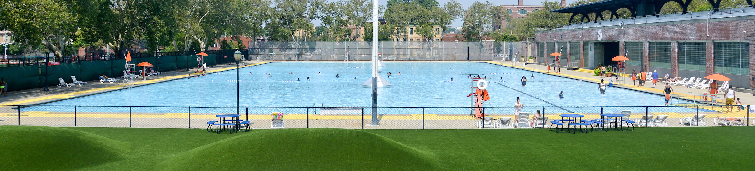 People using a city pool.