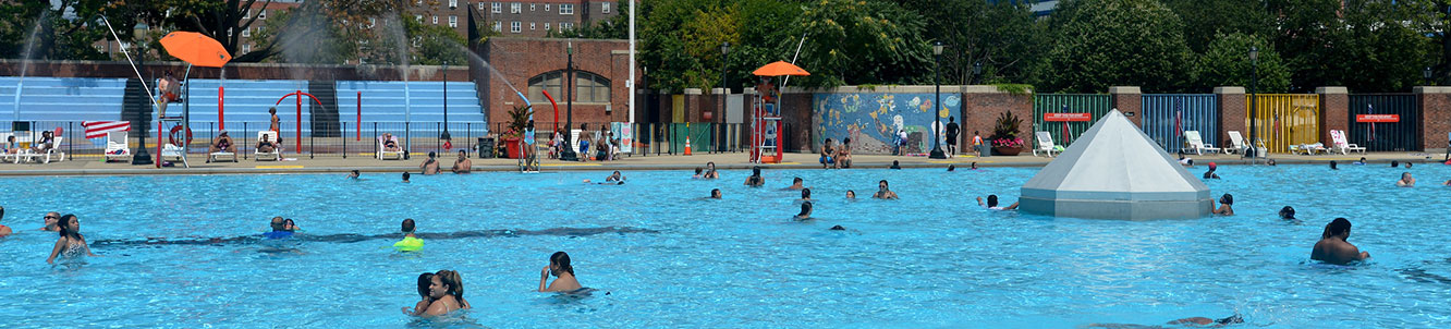 People using a city pool.