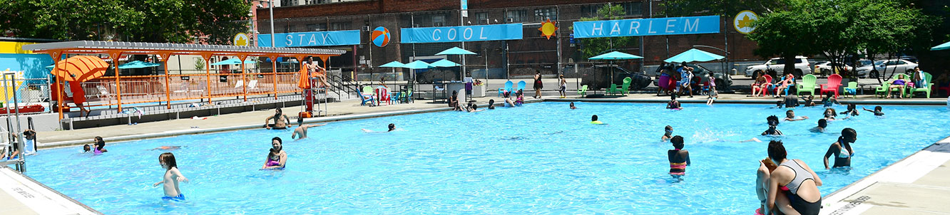 People using a city pool.