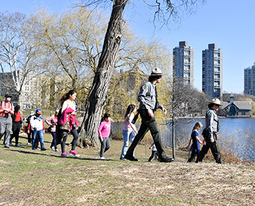 Park rangers lead kids and their families to adventures by the lakeside
