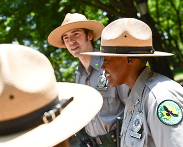 Park rangers chat among themselves