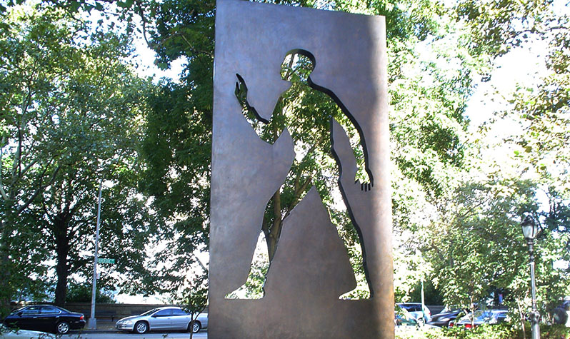 A bronze monolith featuring a hollow silhouette of a man, which is a nod to Ralph Ellison's "Invisible Man" novel and the theme of the book. Photo by Adrian Sas
