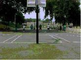 Basketball Courts with Handball Courts in Background 