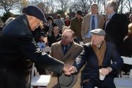 Former NYC Mayor David Dinkins greets former NYC Mayor Ed Koch, as former NY Governor Carey looks on. 