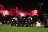 A group enjoys the view from De Witt Clinton Park on July 4, 2009. 