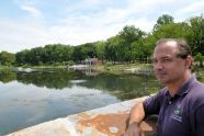 Commissioner Adrian Benepe surveys the restored Indian Lake 