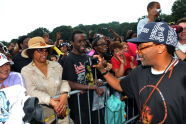 Spike takes pictures of the crowd 