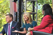 Regis Philbin and Kelly Ripa join Oprah on the stage 
