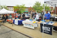 Organizations Standby At Their Booths 
