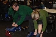 Lacing up their ice skates 