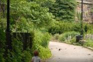 Child running through Fort Tryon Park 